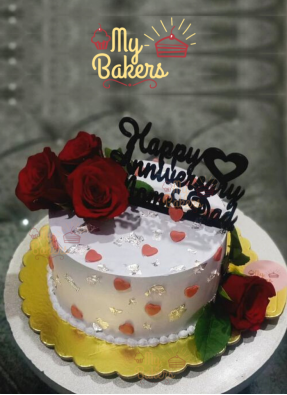 Cream Cake Decorated with Fresh Roses and Silver Foil