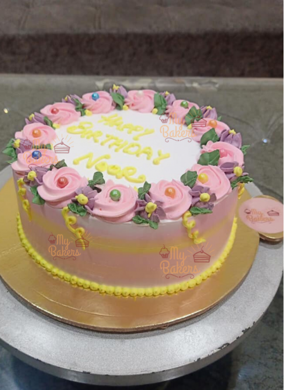 Happy Birthday Noor Cake With Flowers On Top