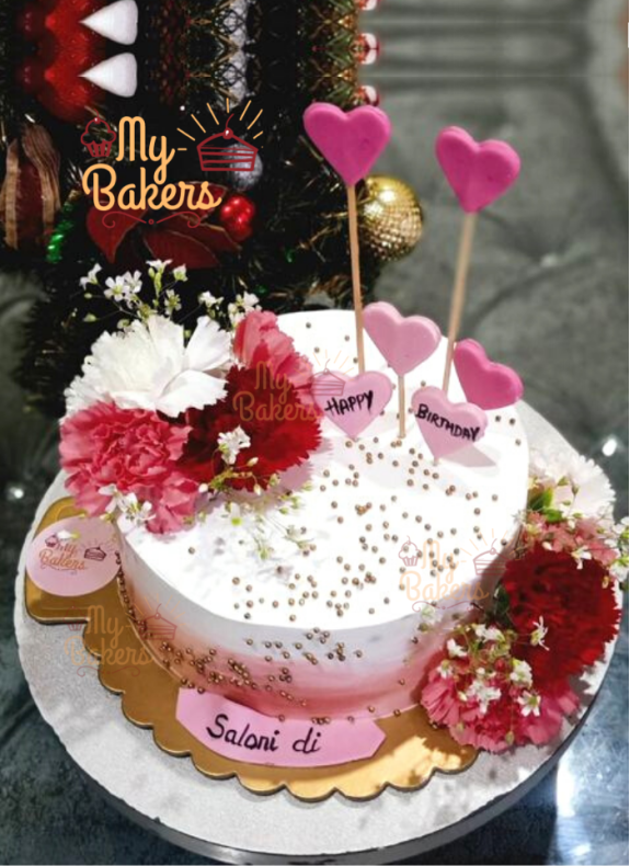 Flat Cream Cake Decorated with Golden Balls and Fresh Flowers